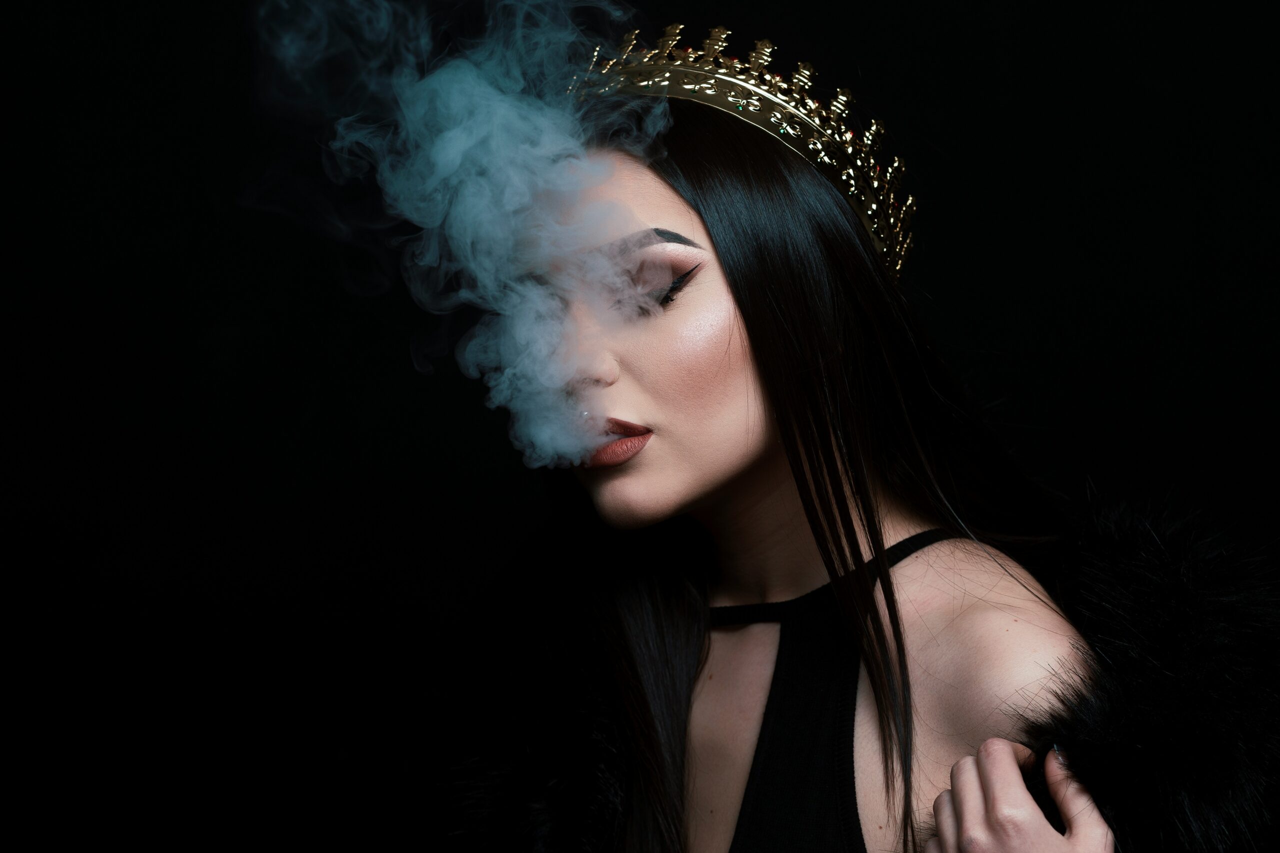 Woman with black hair and smoke for Dark Fantasy book genre