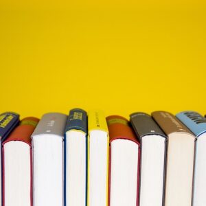 multiple books for reading on a yellow background